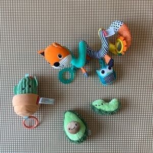 Avocado / Cactus / Stroller toy. Brands: Infantino, Purely Lux and Skip hop.